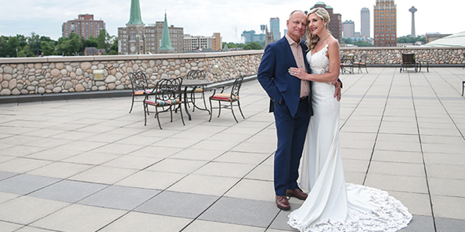 Photo of married couple on Seneca Niagara balcony